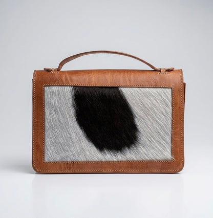 CARTERA DE MANO COW PRINT DE CUERO CON PELO NATURAL