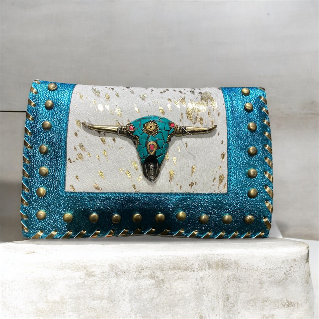 CARTERA DE MANO BOHO CHIC PIEL INDIA CABEZA DE BÚFALO | variación de colores