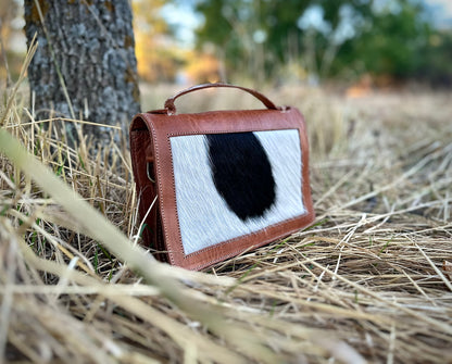 BOLSA DE COURO COM CABELO NATURAL