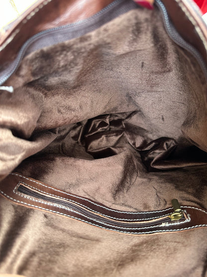 LEATHER BACKPACK WITH ANTI-THEFT CROSSBODY CLOSURE BROWN TILE | 2 colors